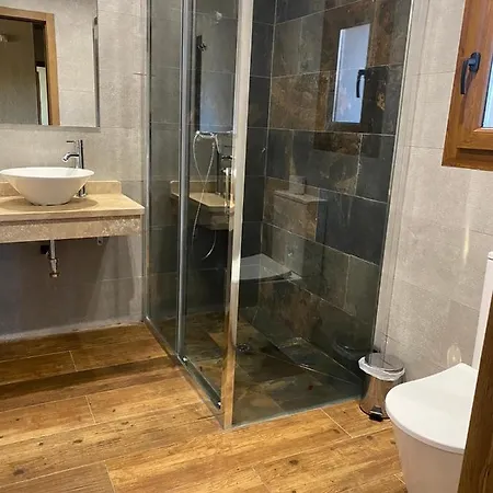 En Εξοχικό σπίτι *